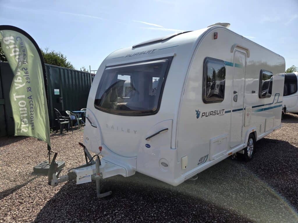 Modern white caravan by Ridgeway Tourers, ideal for family holidays and outdoor adventures.